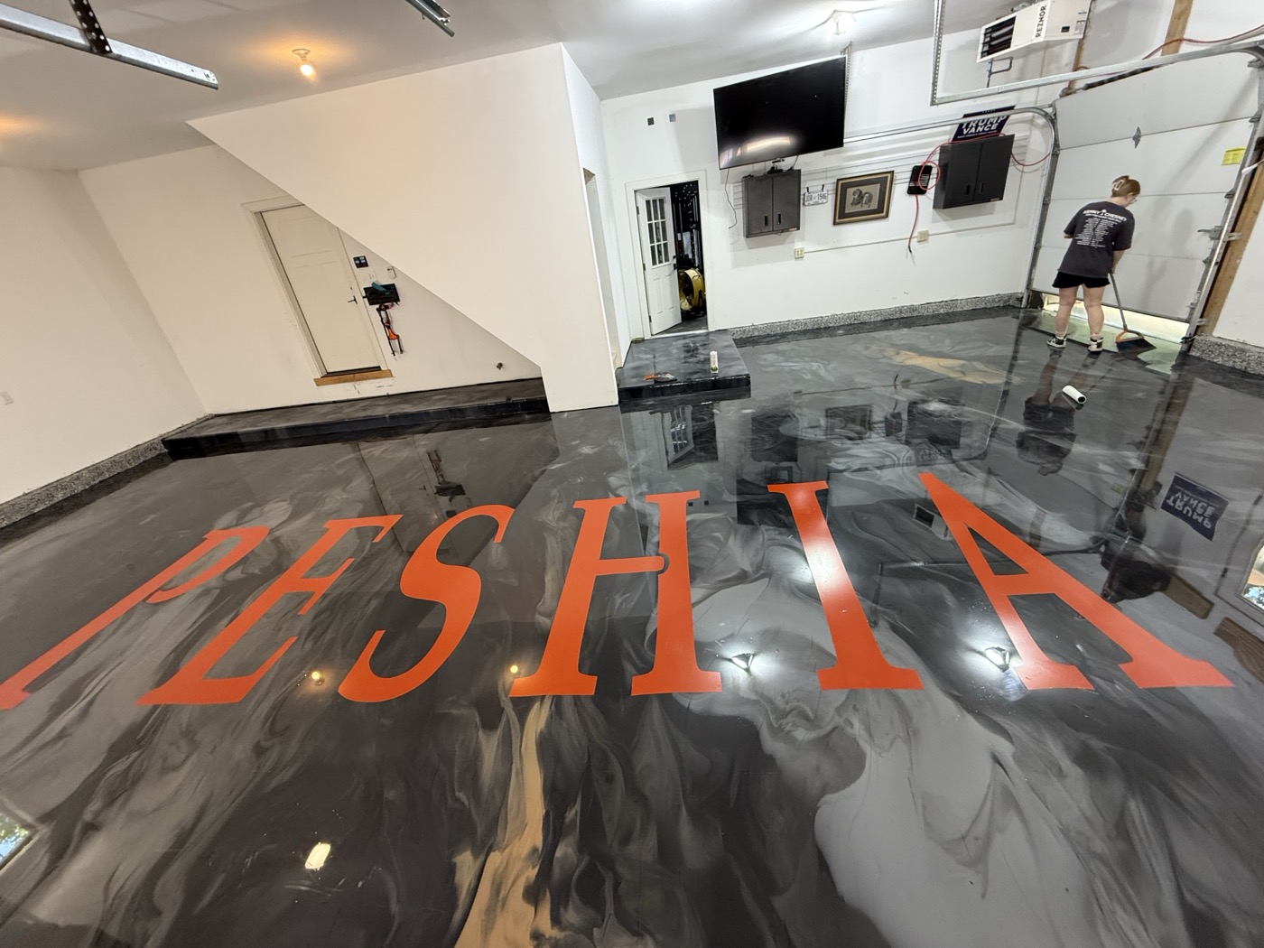Real CrossBuilt job: a customer's name troweled into wet epoxy